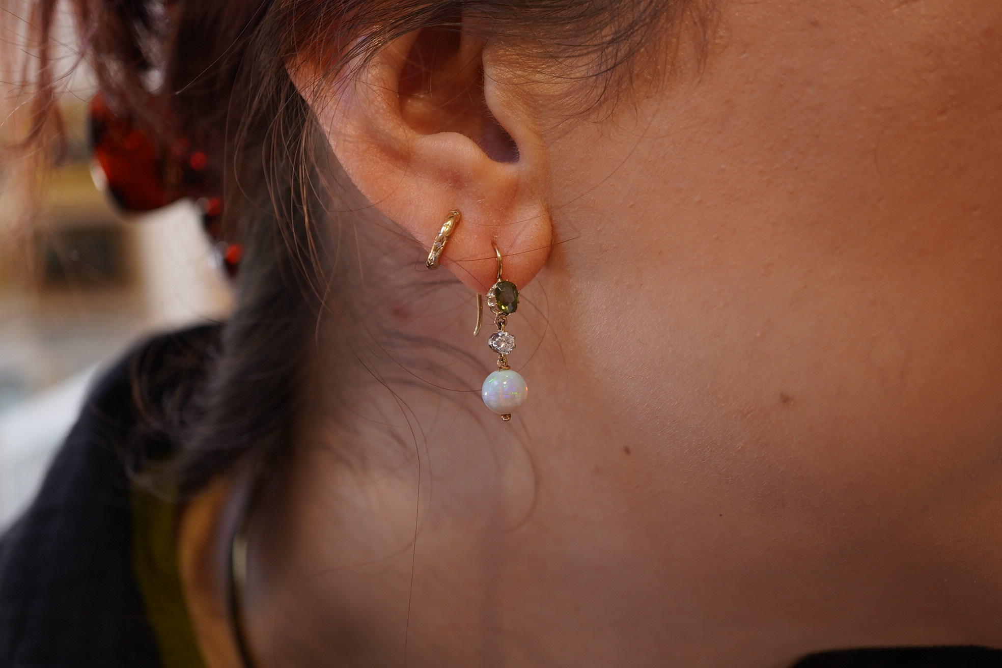 A pair of opal, green zircon and diamond earrings